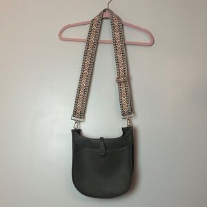 Elegant Black Crossbody Bag with Patterned Strap